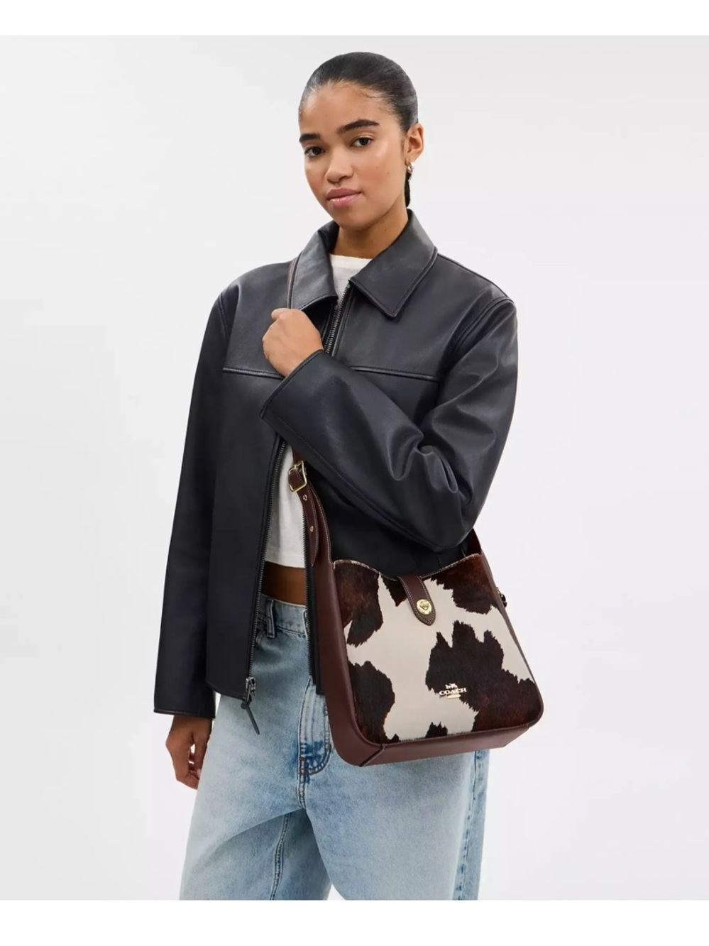 COACH HADLEY CONVERTIBLE
CROSSBODY BAG WITH COW
PRINT AND TASSEL - Picture 1 of 8